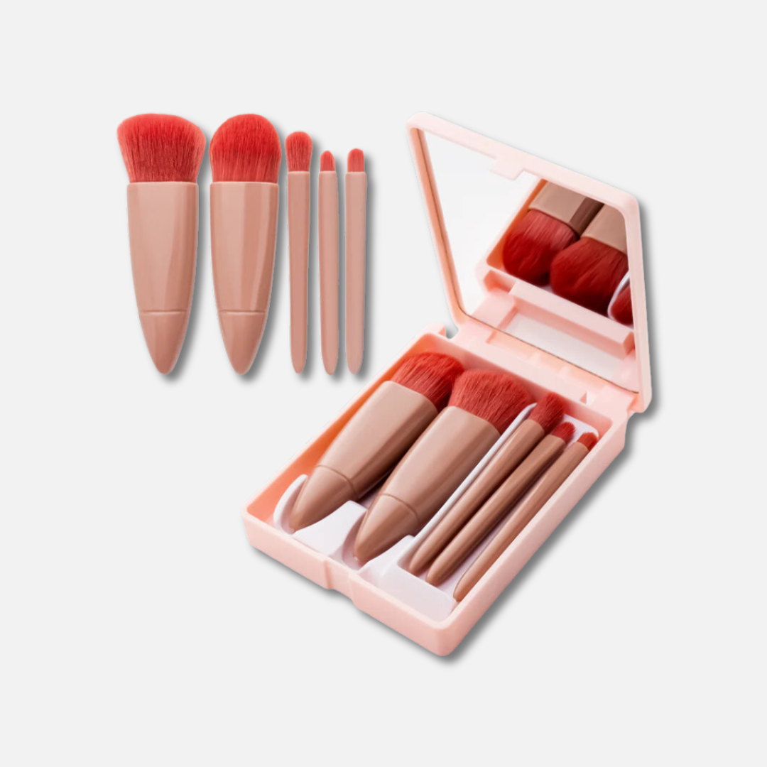 a set of makeup brushes in a pink case